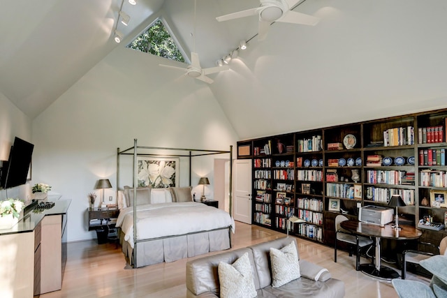 2003 Arrowwood Cir N, Houston, TX 77063 - bedroom featuring track lighting, wood finished floors, ceiling fan, and high vaulted ceiling