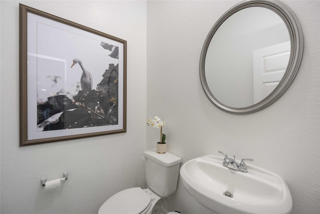 16833 Needlepoint Dr, Conroe, TX 77302 - bathroom featuring a sink and toilet