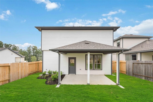 16833 Needlepoint Dr, Conroe, TX 77302 - rear view of house with a yard, a patio area, and a fenced backyard