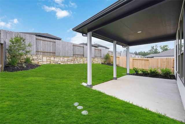 16833 Needlepoint Dr, Conroe, TX 77302 - view of yard featuring a fenced backyard and a patio