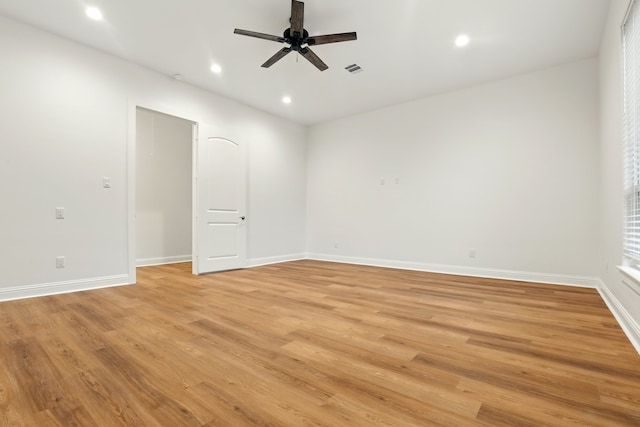 25927 Hunter Ln, Katy, TX 77494 - empty room featuring light wood-style floors, baseboards, ceiling fan, and recessed lighting