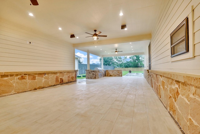 25927 Hunter Ln, Katy, TX 77494 - view of patio / terrace with exterior kitchen and a ceiling fan