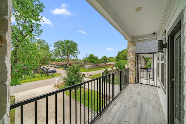 balcony featuring a residential view
