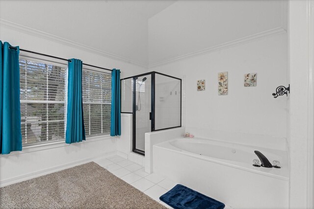 full bathroom with a stall shower, tile patterned flooring, ornamental molding, and a bath