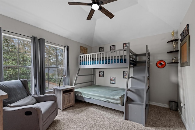 bedroom with lofted ceiling, light carpet, baseboards, and a ceiling fan