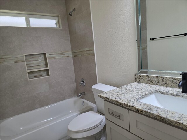 2140 De Soto St, Houston, TX 77091 - bathroom with toilet, tub / shower combination, and vanity