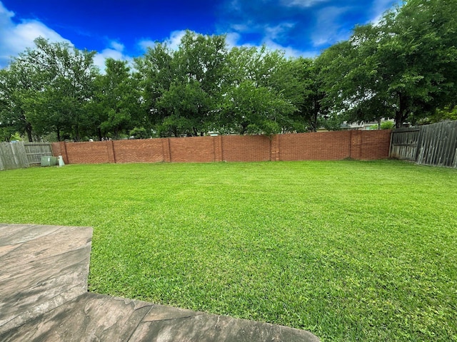 2227 Greenhaven Dr, Sugar Land, TX 77479 - view of yard with a fenced backyard