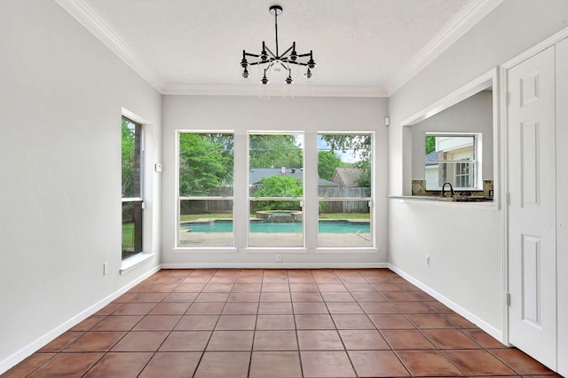 unfurnished sunroom featuring a wealth of natural light and a notable chandelier