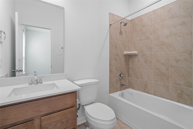 bathroom featuring toilet, shower / bathtub combination, and vanity