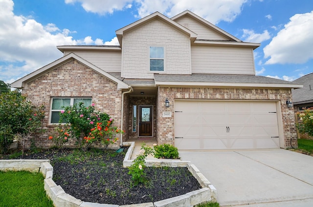 24430 Vittorio Wood Ln, Katy, TX 77493 - traditional-style house featuring brick siding, concrete driveway, a garage, and a shingled roof