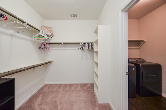 24430 Vittorio Wood Ln, Katy, TX 77493 - walk in closet with washer and clothes dryer and carpet floors
