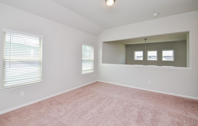 24430 Vittorio Wood Ln, Katy, TX 77493 - carpeted empty room with baseboards, lofted ceiling, and a smoke detector