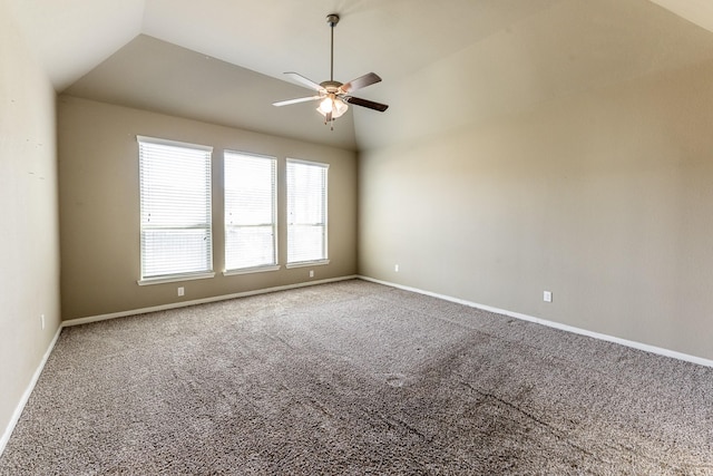 3713 Daisy Ln, Huntsville, TX 77340 - unfurnished room featuring vaulted ceiling, a ceiling fan, carpet floors, and baseboards