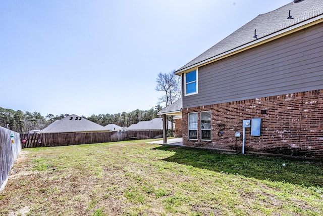 3713 Daisy Ln, Huntsville, TX 77340 - view of yard with a fenced backyard and a patio area