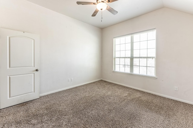 3713 Daisy Ln, Huntsville, TX 77340 - carpeted spare room featuring vaulted ceiling, baseboards, and ceiling fan