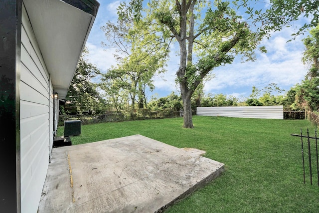 view of yard featuring a fenced backyard and a patio area