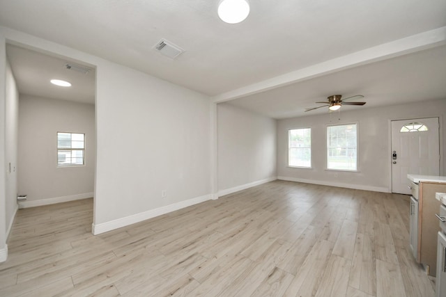 8014 Crestview Dr, Houston, TX 77028 - unfurnished living room with light wood-style flooring and ceiling fan