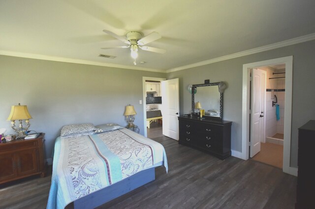 504 Cedar St, Sweeny, TX 77480 - bedroom featuring dark wood-style floors, crown molding, a spacious closet, ceiling fan, and baseboards