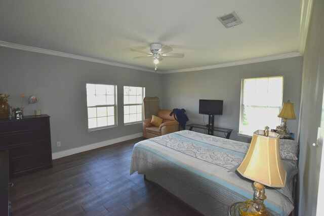 504 Cedar St, Sweeny, TX 77480 - bedroom with crown molding, multiple windows, baseboards, dark wood-type flooring, and a ceiling fan