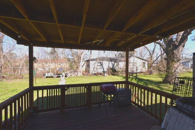 504 Cedar St, Sweeny, TX 77480 - wooden deck with a lawn