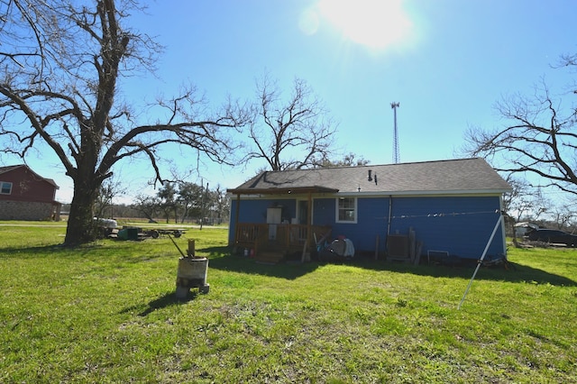504 Cedar St, Sweeny, TX 77480 - rear view of property featuring a yard