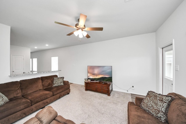 carpeted living room featuring baseboards, recessed lighting, and ceiling fan