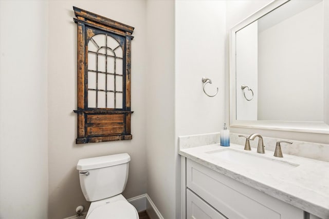 6605 Rolla St, Houston, TX 77055 - bathroom featuring vanity, toilet, and baseboards
