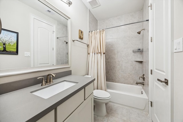 6605 Rolla St, Houston, TX 77055 - full bathroom featuring toilet, visible vents, shower / tub combo, and tile patterned floors