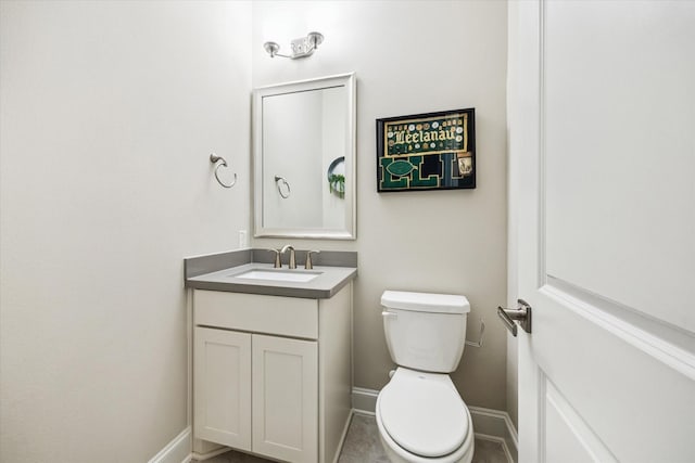 6605 Rolla St, Houston, TX 77055 - half bathroom with toilet, vanity, and baseboards