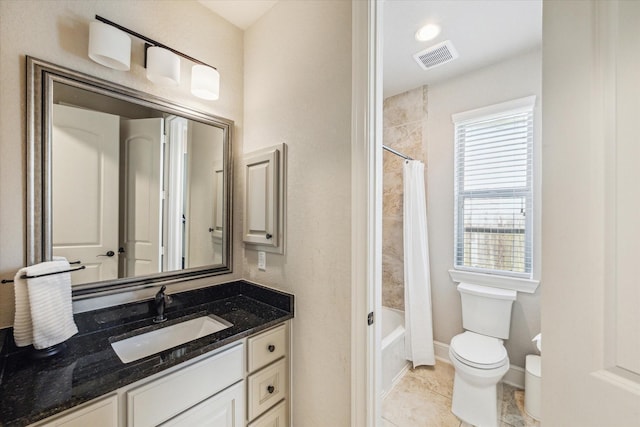 8207 Mesquite Hill Ln, Richmond, TX 77469 - full bathroom with visible vents, tile patterned flooring, vanity, toilet, and shower / bathtub combination with curtain