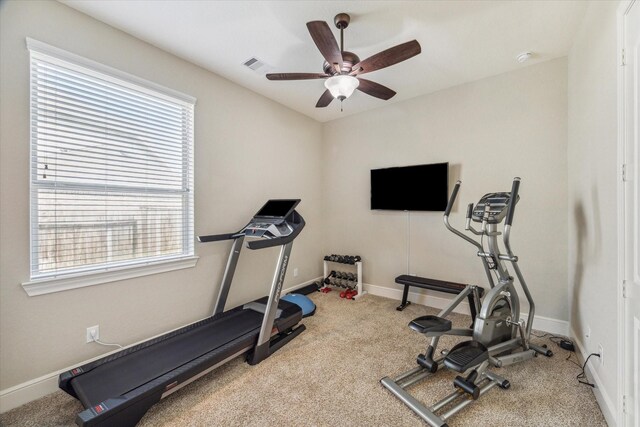 8207 Mesquite Hill Ln, Richmond, TX 77469 - workout room with carpet floors, a ceiling fan, visible vents, and a wealth of natural light
