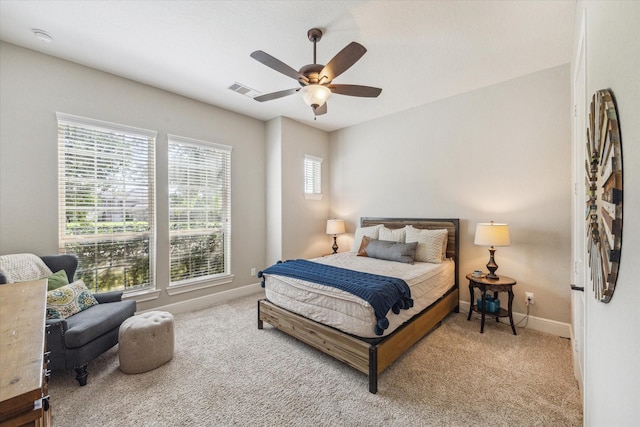 8207 Mesquite Hill Ln, Richmond, TX 77469 - carpeted bedroom featuring visible vents, baseboards, and ceiling fan