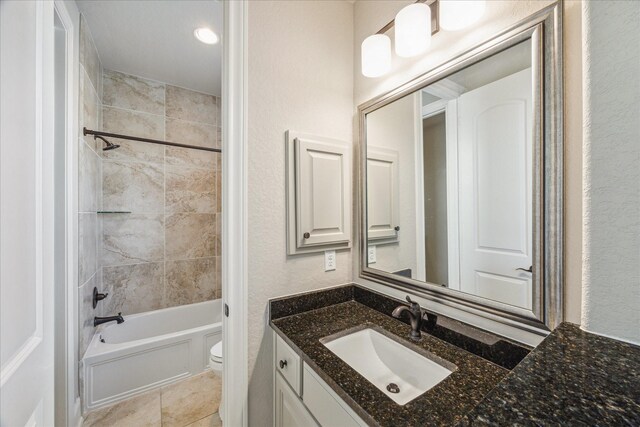 8207 Mesquite Hill Ln, Richmond, TX 77469 - full bath featuring vanity, tile patterned flooring, toilet, and shower / washtub combination