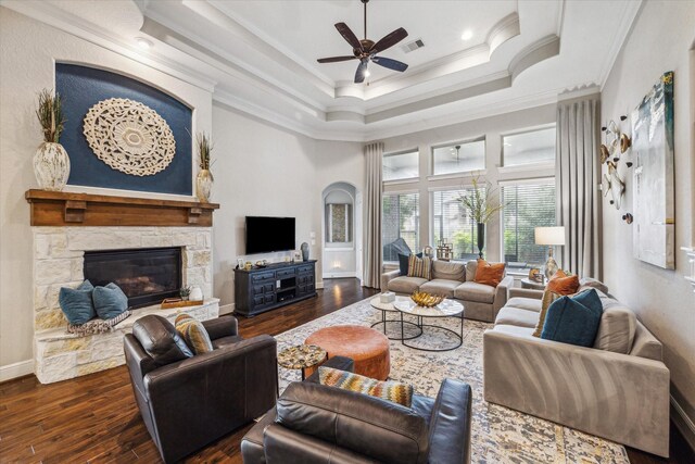 8207 Mesquite Hill Ln, Richmond, TX 77469 - living area featuring dark wood-style flooring, a ceiling fan, visible vents, and ornamental molding