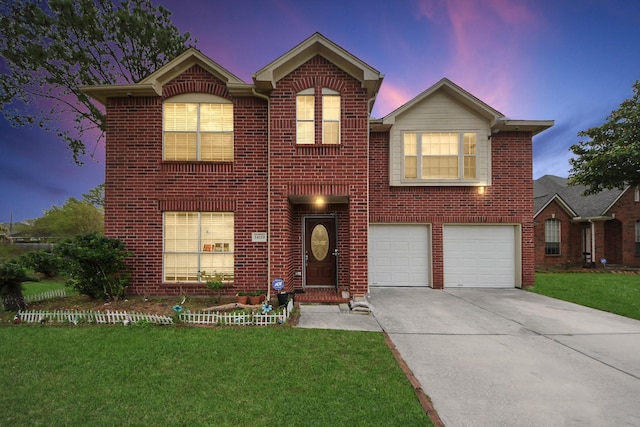 traditional-style house featuring a garage, a front lawn, brick siding, and concrete driveway