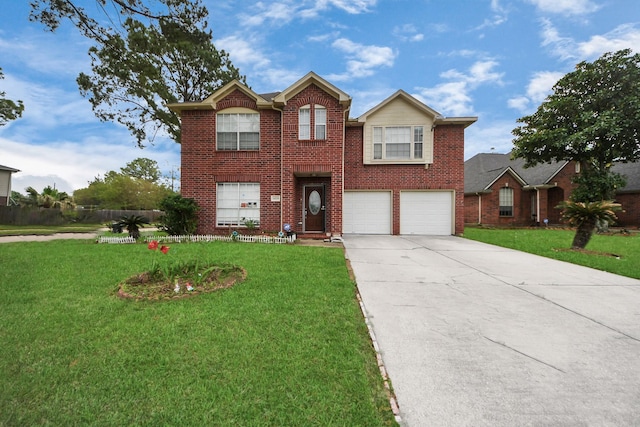traditional-style home featuring concrete driveway, a front yard, and a garage