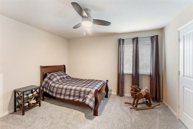 18823 Cove Mill Ln, Cypress, TX 77433 - bedroom featuring light carpet and ceiling fan