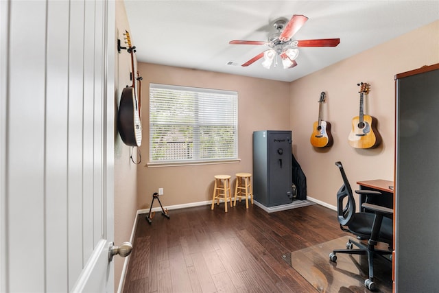 office featuring wood finished floors, visible vents, a ceiling fan, and baseboards