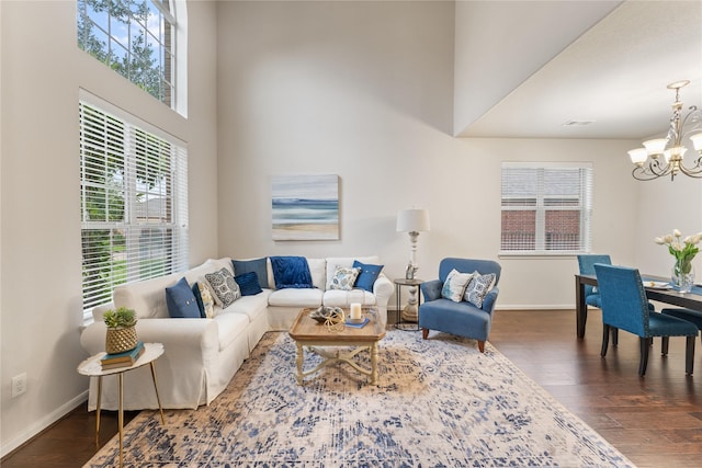 18823 Cove Mill Ln, Cypress, TX 77433 - living area with a chandelier, dark wood-style flooring, and a high ceiling