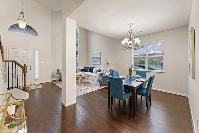 18823 Cove Mill Ln, Cypress, TX 77433 - dining area featuring stairs, a chandelier, and dark wood-style floors