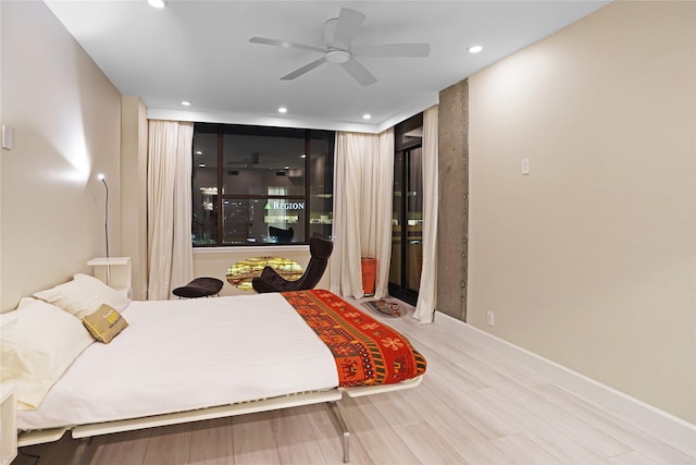 bedroom with ceiling fan, baseboards, and recessed lighting