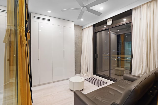 interior space featuring ceiling fan and recessed lighting