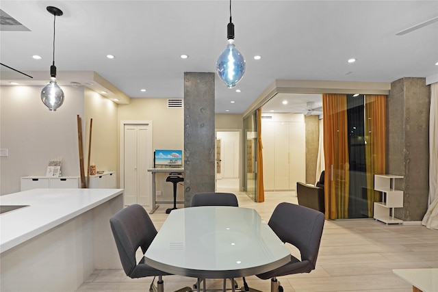 dining room with a ceiling fan, visible vents, recessed lighting, and light wood-style flooring