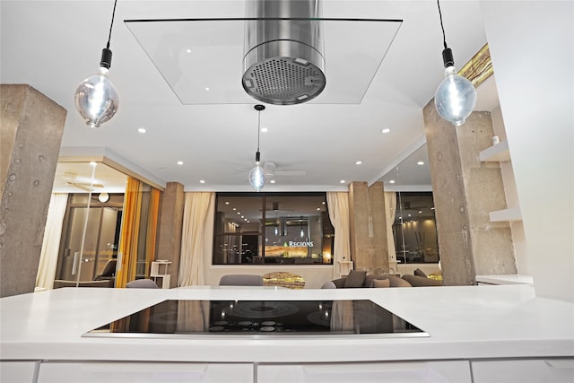 bar featuring black electric stovetop, a ceiling fan, recessed lighting, and hanging light fixtures