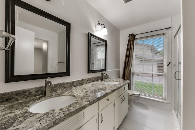 302 Hickory Ridge Dr, El Lago, TX 77586 - bathroom featuring double vanity, toilet, tile patterned floors, and a sink