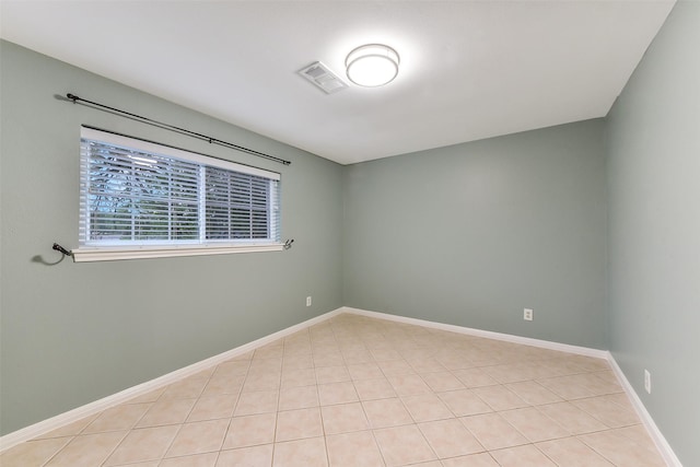 302 Hickory Ridge Dr, El Lago, TX 77586 - empty room with light tile patterned floors, visible vents, and baseboards