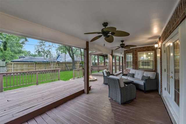 302 Hickory Ridge Dr, El Lago, TX 77586 - wooden deck featuring a fenced backyard, ceiling fan, an outdoor hangout area, french doors, and a lawn