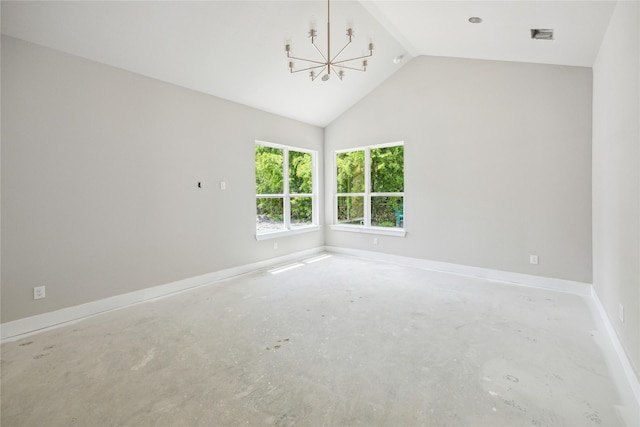 spare room featuring high vaulted ceiling, concrete flooring, an inviting chandelier, and baseboards