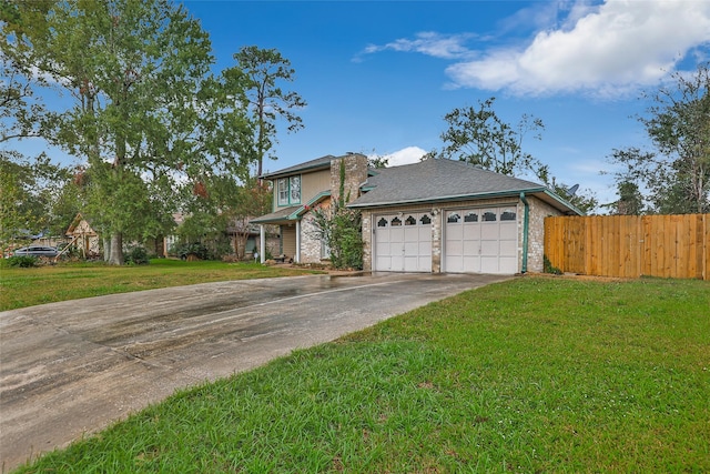 906 N Chamfer Way, Crosby, TX 77532 - traditional-style house featuring a chimney, fence, a front lawn, an attached garage, and driveway