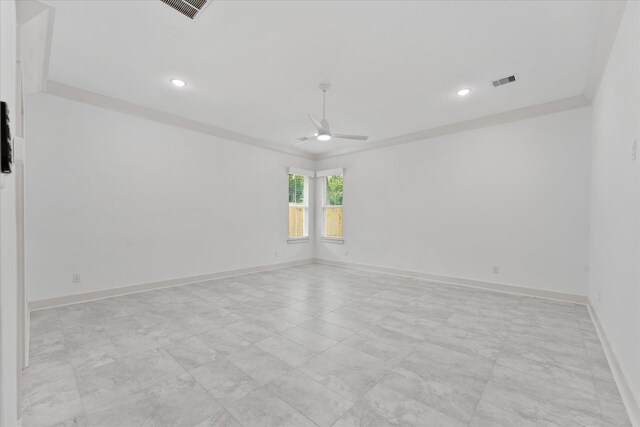 spare room with visible vents, recessed lighting, baseboards, and ceiling fan